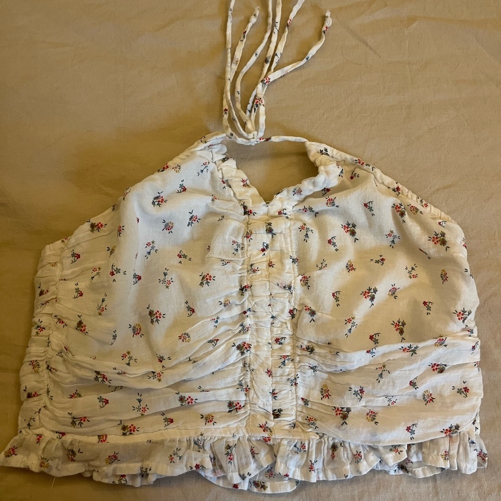 American Eagle white tank top with multi-colored flowers (size M)